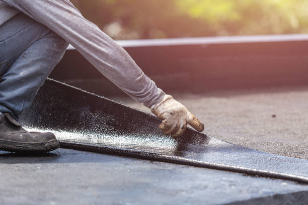 Professional Emergency Waterproofing technician working in Greensboro, MD